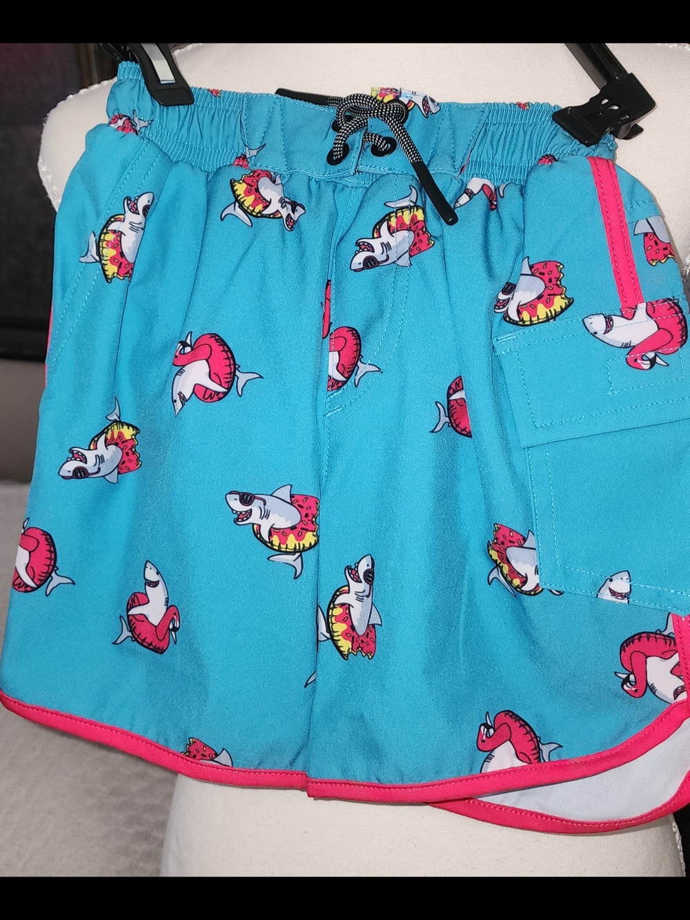 Sovereign Code Turquoise Shark Donut Swim Trunks with Pink Trim